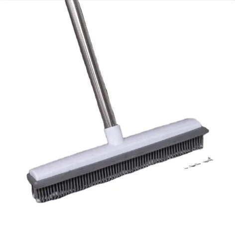 Fur Rake pulling pet hair from carpet