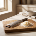 Luniee Cheese Grater on a cutting board