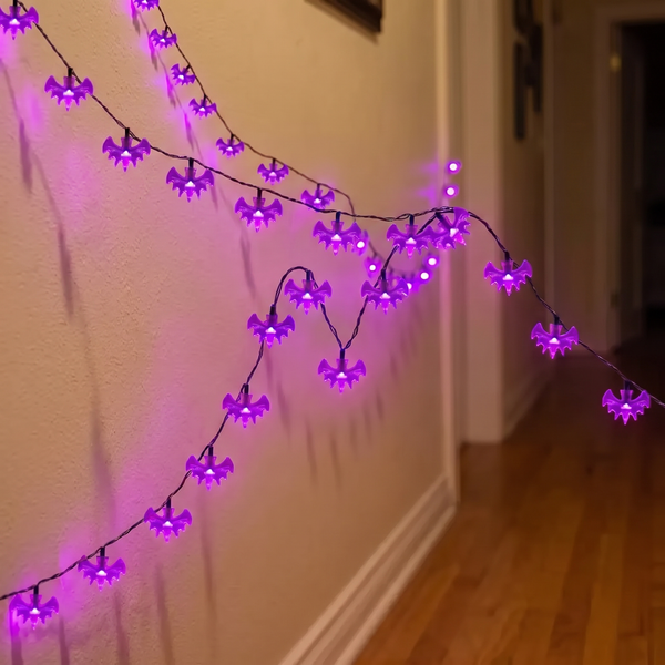 Luniee Purple Bat Lights glowing along a dark hallway wall